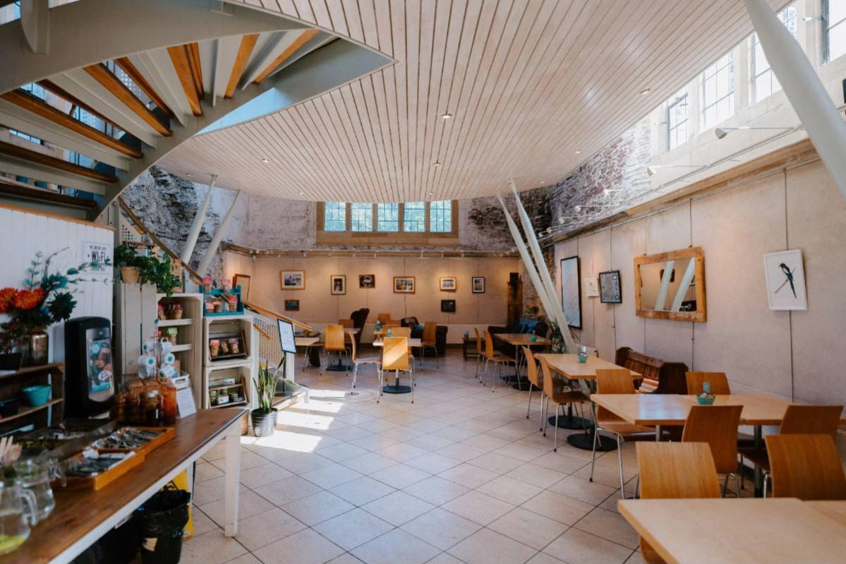Inside MamGu's Kitchen: the vaulted timber ceiling and stone walls of the Cathedral Refectory, St Davids