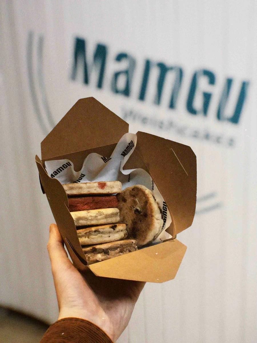 A takeaway box of MamGu Welsh cakes in assorted flavours